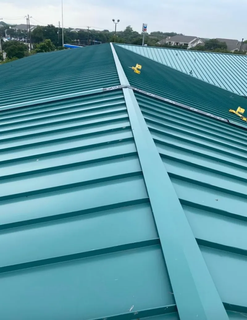 Green commercial metal roof ridge and valley for Metal Roof Repair in West Bridgewater