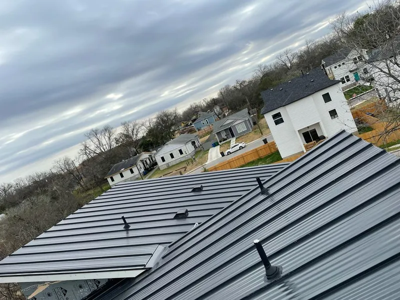 Standing seam metal roof panels with vents for Skylight Repair in West Bridgewater